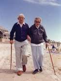 elderly medical alert, walking on beach